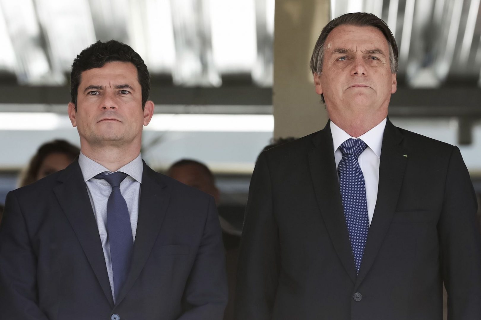 IGOR VIDOR 25 Brazil's President Jair Bolsonaro, right, and Justice Minister Sergio Moro attend a military ceremony in Brasilia, Brazil, 2019.  (Marcos Correa/Brazil's Presidential Press Office via AP)
