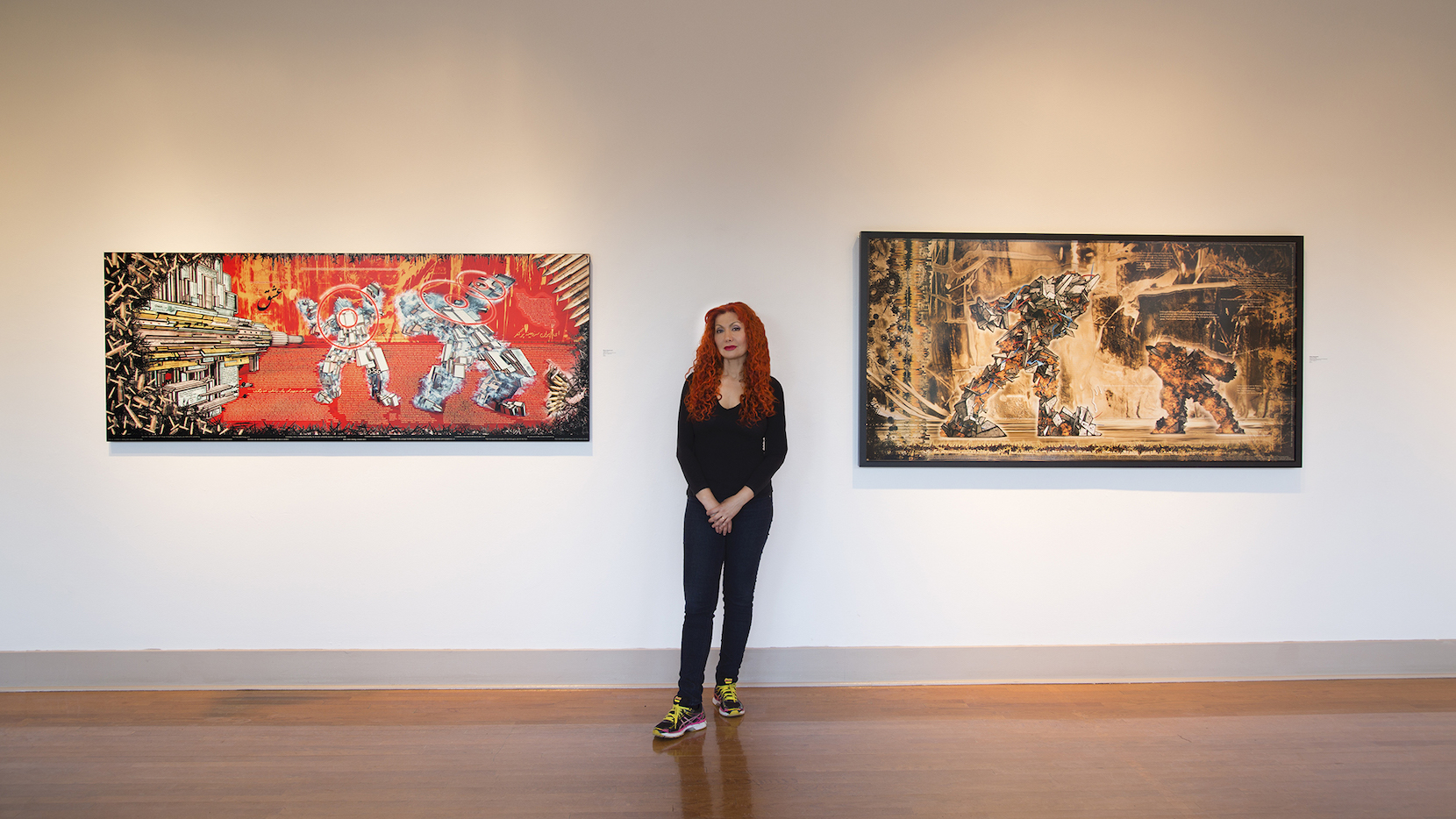 Marjan Moghaddam with her digital Paintings "Shot in Iran" and "David and Goliath", (both 2012) at Main Line Art Center in 2015