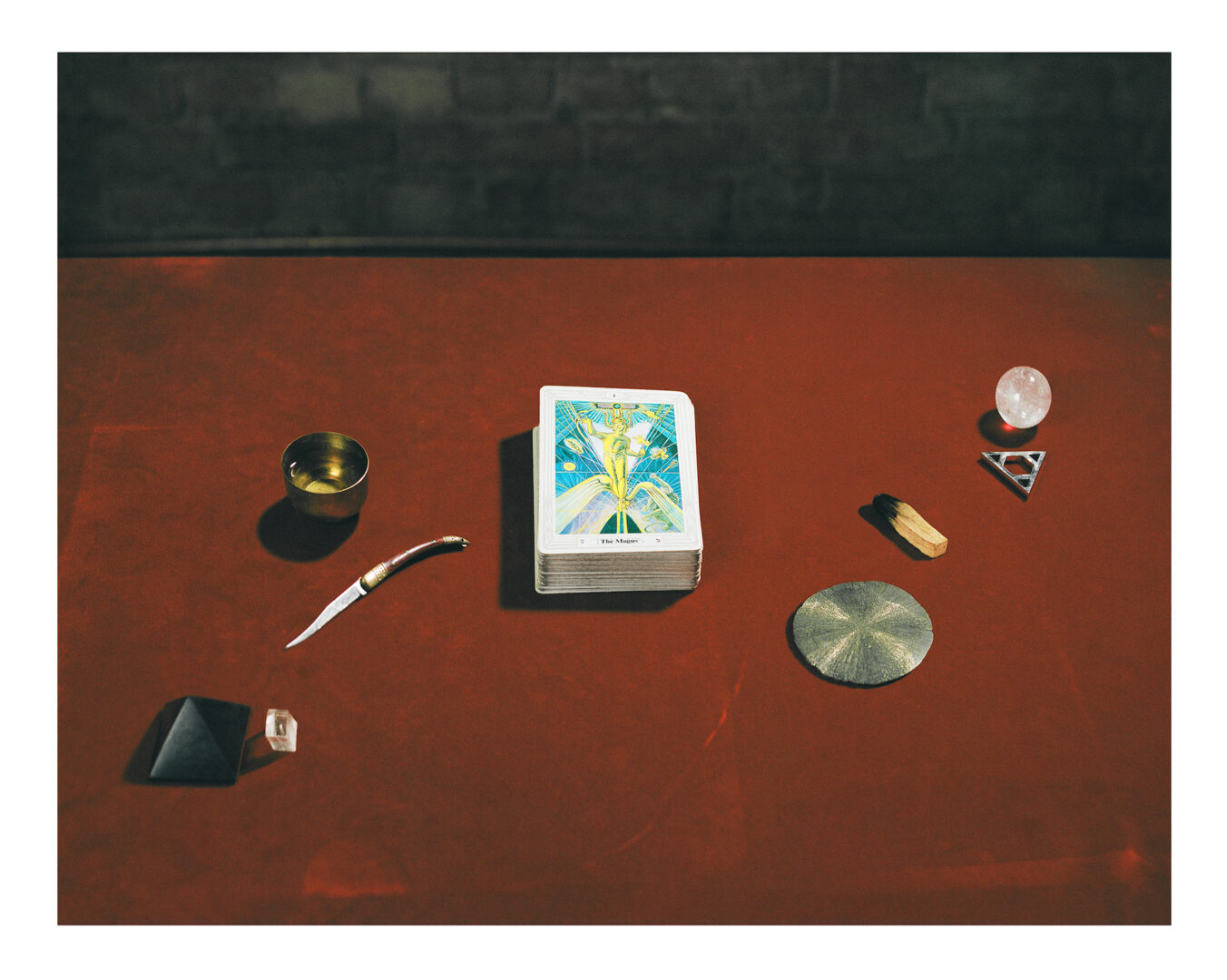 GØNEJA ✷ 9 Tarot: Thoth, (2022), inkjet print, 48 x 60 cm | Still life composition of a Thoth Tarot deck portraying “The Magus” Trump and its four elements.